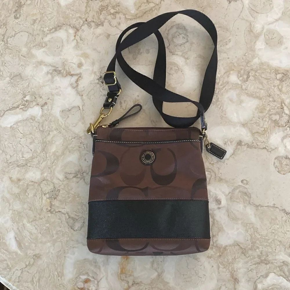 Coach Black/Aubergine Brown Signature Canvas Swingpack Adjustable Crossbody Bag